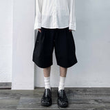 Side-Studded Pleated Baggy Shorts