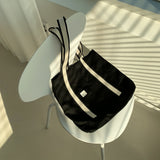 White on black tote bag