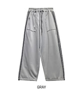 Solid track line two way training pants