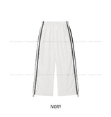Ruffy Lace Track Nylon Pants