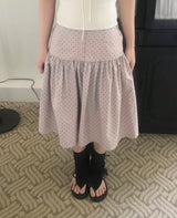 cheek dot flare button midi sk