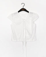 Cuyan dot button strap short-sleeve blouse