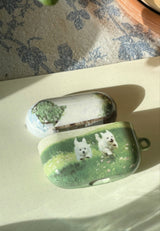 [ジョギング中の子犬のAirPods/Budsケース]