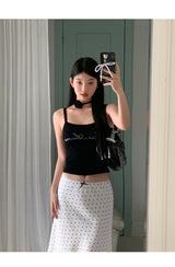 Marshmallow beaded black sleeveless top