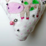 Pierced pinky cow keychain
