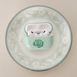 Rose polka-dot glossy blue and green airPods case