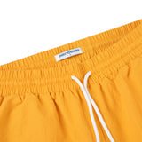 Script Logo Nylon Shorts - Yellow