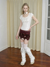 Emoha Stylish Low-Rise Mini Skirt with Glossy Cow-Print Calf Hair Paneling