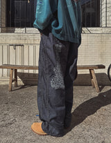 キューバックペインティングデニムパンツ