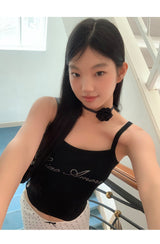 Marshmallow beaded black sleeveless top