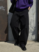 Unbalanced pintuck curved pants