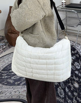 Reven padded crossbody bag
