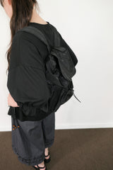 dot string pocket backpack