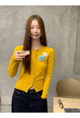 フラワーブローチイエローラウンドカーディガン