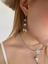 Three silver balls drop earrings