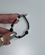 mere black bracelet