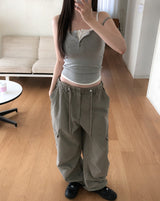 [U-BASIC] Rollin Button Round Sleeveless Top