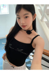 Marshmallow beaded black sleeveless top