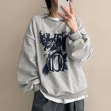 シェリンペインティングレタリングボクシースウェットシャツ