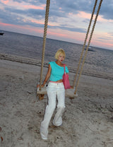 linen white low bootcut jeans