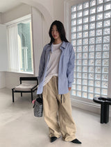CURVED TUCK COTTON TROUSER