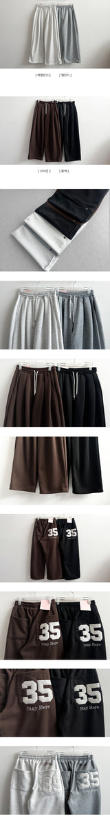 Kello 35 patch embroidered pin tuck wide pants