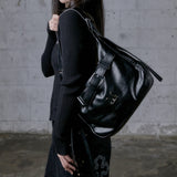 MONIC METAL LOGO FRONT BELTED LEATHER SHOULDER BAG UNISEX