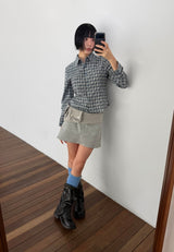 TINY BUTTON MINI SKIRT