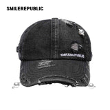 Black Distressed Denim Baseball Cap with Pearl-Tone Pendant and Metal Ring Details