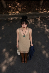 FRINGE-HEM KNIT V-NECK DRESS IN BEIGE