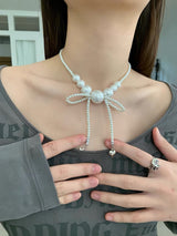 White pearl bow necklace
