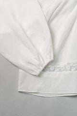 Pale lace blouse