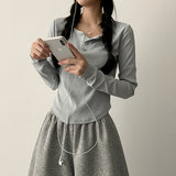 Its Hem Round Button Long Sleeve Tee