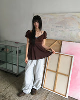 Kiaco Heart Neck Puffed Ribbon Punching Short-Sleeved Blouse