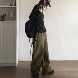 シクダメージラウンドルーズフィットロングスリーブニット