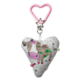 Pierced pinky cow keychain