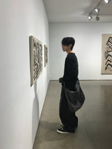ルイナーレザーポケットローデニムパンツ
