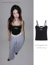 Lace lettering padded sleeveless shirt with a built-in cap