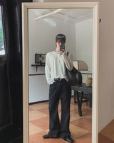 Curden Diagonal Cut Curved Bootcut Pants