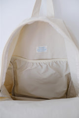 an everywhere daypack, cream beige