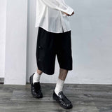 Side-Studded Pleated Baggy Shorts