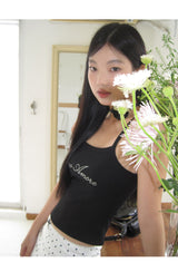 Marshmallow beaded black sleeveless top