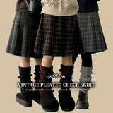 Bomi A-line pleated check midi skirt 