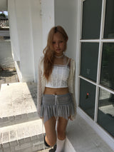 Frill muffler top