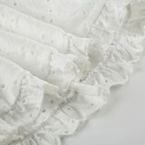 a punching eyelet bustier blouse