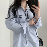 Cain lettering embroidered Oxford striped shirt