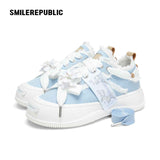 Women's Light Blue Frayed Canvas Smile Toe Platform Sneakers