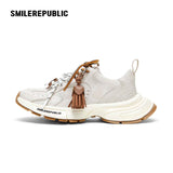 Off-White Burnished Leather Low Top Chunky Sneakers with Tassel Charms, Unisex