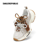Off-White Burnished Leather Low Top Chunky Sneakers with Tassel Charms, Unisex