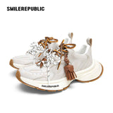 Off-White Burnished Leather Low Top Chunky Sneakers with Tassel Charms, Unisex